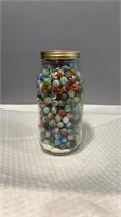 500 + vintage agate marbles in 2 quart jar.