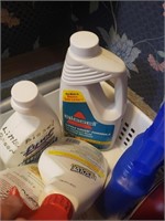 Basket of Various Cleaning Supplies