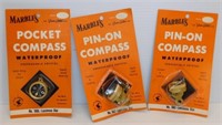 (3) Compasses in original packaging.