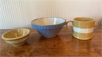 Two antique mixing bowls and a yellow ware mug