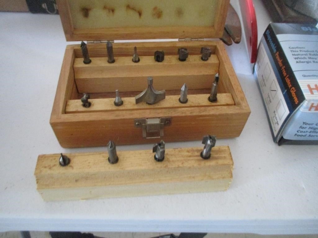 15 Drill bits in wooden case