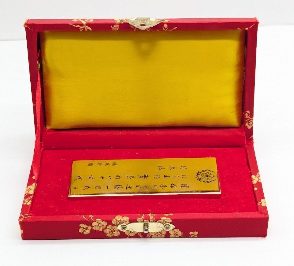 Gold Coloured Solid Rectangle With Asian Writing