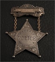Silver & gold Suspension Badge for Ralph Chocran