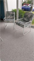 Pair of metal cushioned chairs