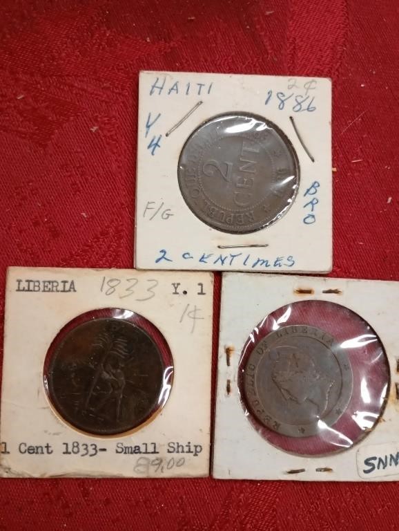 Two Libyan and one Haiti coin