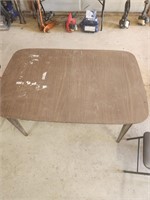 Wood legged formica topped table 39.5wx59.5l
