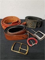 Three leather belts with buckles