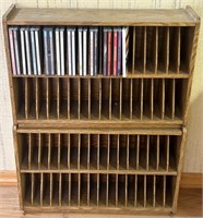 E - CD / DVD RACK W/ CONTENTS 24X19" (F31)