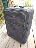 Locomotor suitcase with wheels