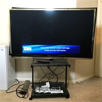 Panasonic 60" TV on Rolling Stand