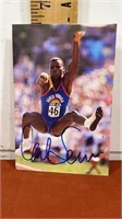 4” x 6”. Carl Lewis signed photo