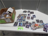 Box of assorted trading cards; mostly baseball and