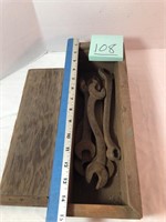 Old wrenches in wood box w/slide lid