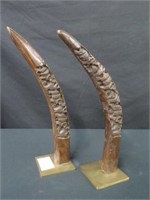 PAIR CARVED WOODEN TUSK FIGURES