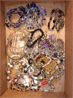 box of costume jewelry