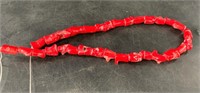 Strand of red coral beads 10" long
