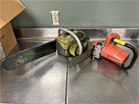 Poulan gas chainsaw and electric chainsaw