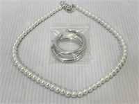 Faux pearl necklace and silver toned hoop earrings