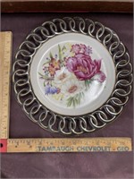 Floral plate painted highlights black rim