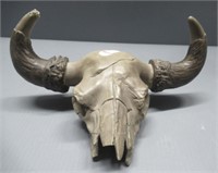 Skull figure. Measures: 5.5" H x 11.5" W. Note: