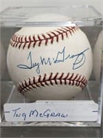 SIGNED BALL IN ACRLYIC CASE TUG MCGRAW
