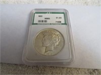 1 Graded 1922 Peace Silver Dollar in Plastic Case