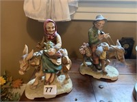 FIGURINES OF MAN AND WOMAN ON DONKEYS, 8" TALL