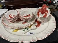Lobster decorated serving dishes.