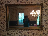 Ornate gold-framed mirror