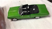Die cas green car - has a remote for lights-