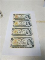 Lot of four CANADA one dollar bills