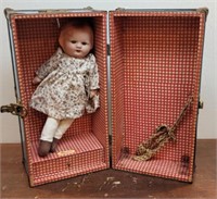 Doll with doll trunk