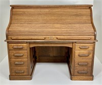 Oak roll top desk, "S" roll, double pedestal,