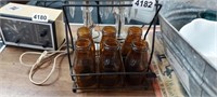 (6) BROWN BOTTLE CANDLE GLOBE HOLDERS WITH RACK