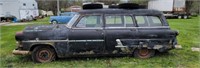 1953 Ford Country sedan. Has title.