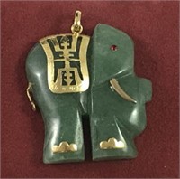 Gold Ruby and Jade Carved Elephant Pendant