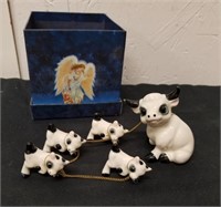 Group of ceramic collectible cows