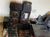 Lot of steroes, seakers, alarm clocks, and other