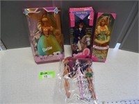 Barbies and Monster High dolls