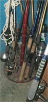 Lot of 11 fishing rods and reels.