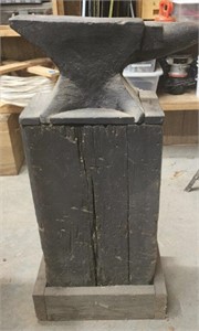 Anvil on wooden stand