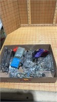 Box of tire guards, wrenches etc