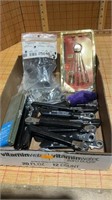 Box of wrenches, wire brushes etc.