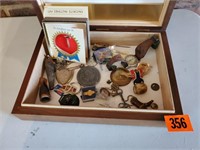 Cigar box, watch, bridle rosettes, pins, coins,