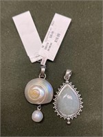 TWO STERLING SILVER PENDANTS - ONE WITH SEASHELL