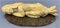 Beautiful ivory carving by Susie Silook of a nativ