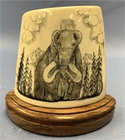 Fossilized mammoth ivory scrimshawed by Michael Sc