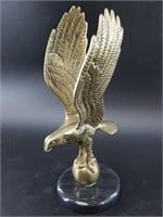 Brass eagle on a small marble base, 11"