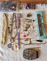 Necklaces, earrings, belt buckle, beads