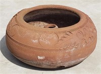 nice terra cotta hose pot or even succulent plante